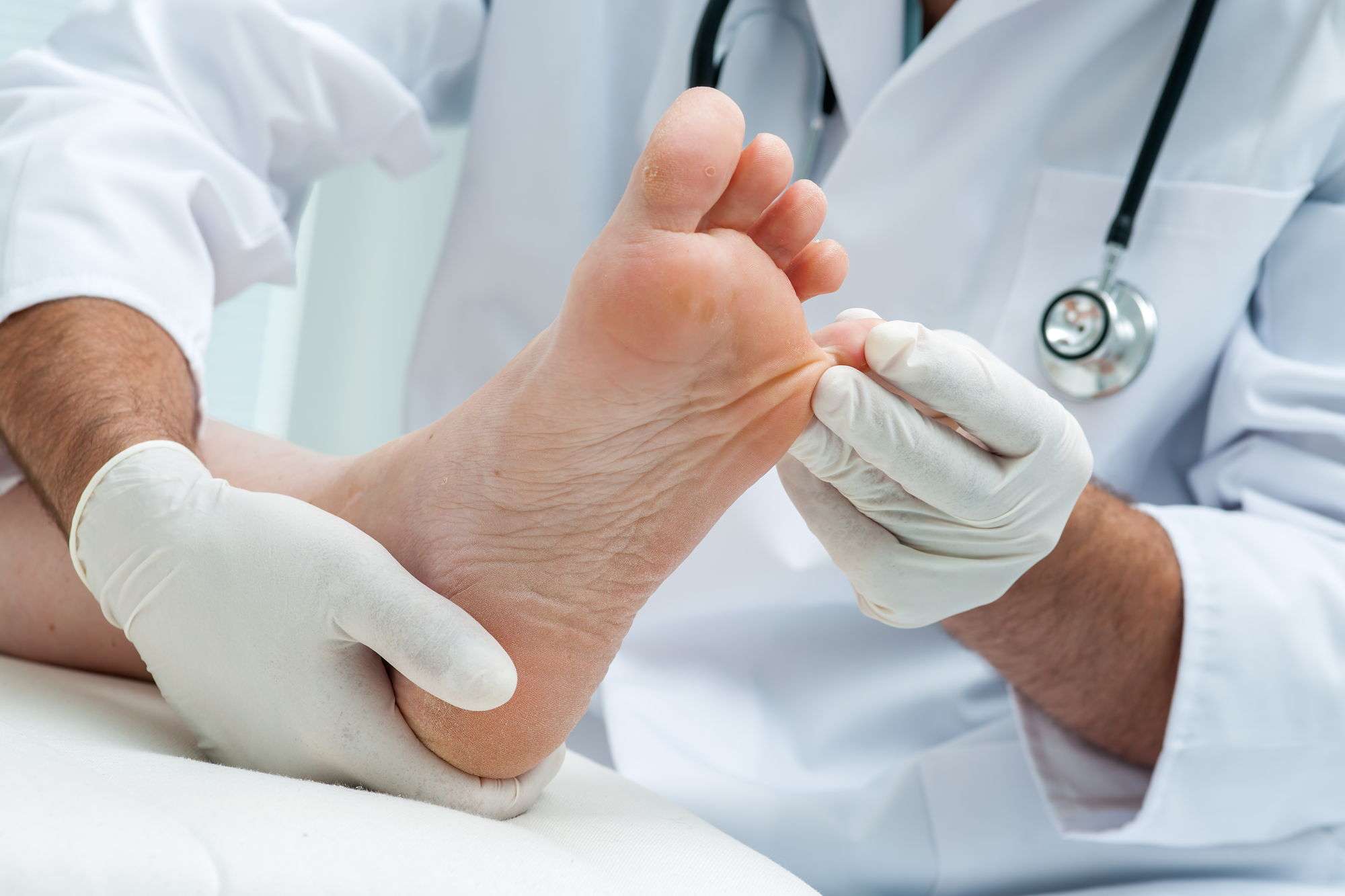chiropodist working on a foot